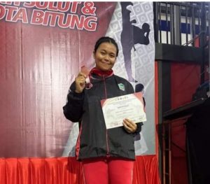 Queen silitonga Sumbang medali pada Tim kontingen Polda Sulut di kejuaraan Karate Kejati Cup Sulut 2023.