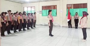 GUGUS DEPAN SMPN 1 BOLAANG GELAR UPACARA KENAIKAN TINGKAT PENGGALANG RAMU DAN RAKIT 