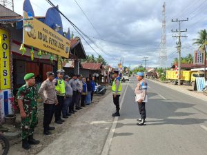 Pos Pam I Barumun tengah melaksanakan apel pagi di depan pos Pam